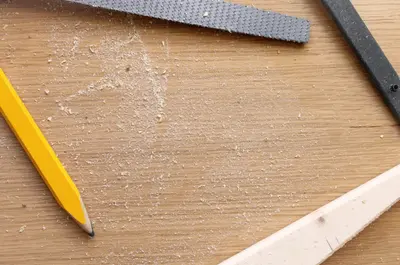 A person carving intricate designs onto a wooden sign, showcasing the craftsmanship and attention to detail involved in creating custom wooden signs.