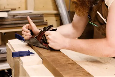 A person assembling rustic wooden shelves, showcasing the DIY woodworking process for creating handmade home decor accents.